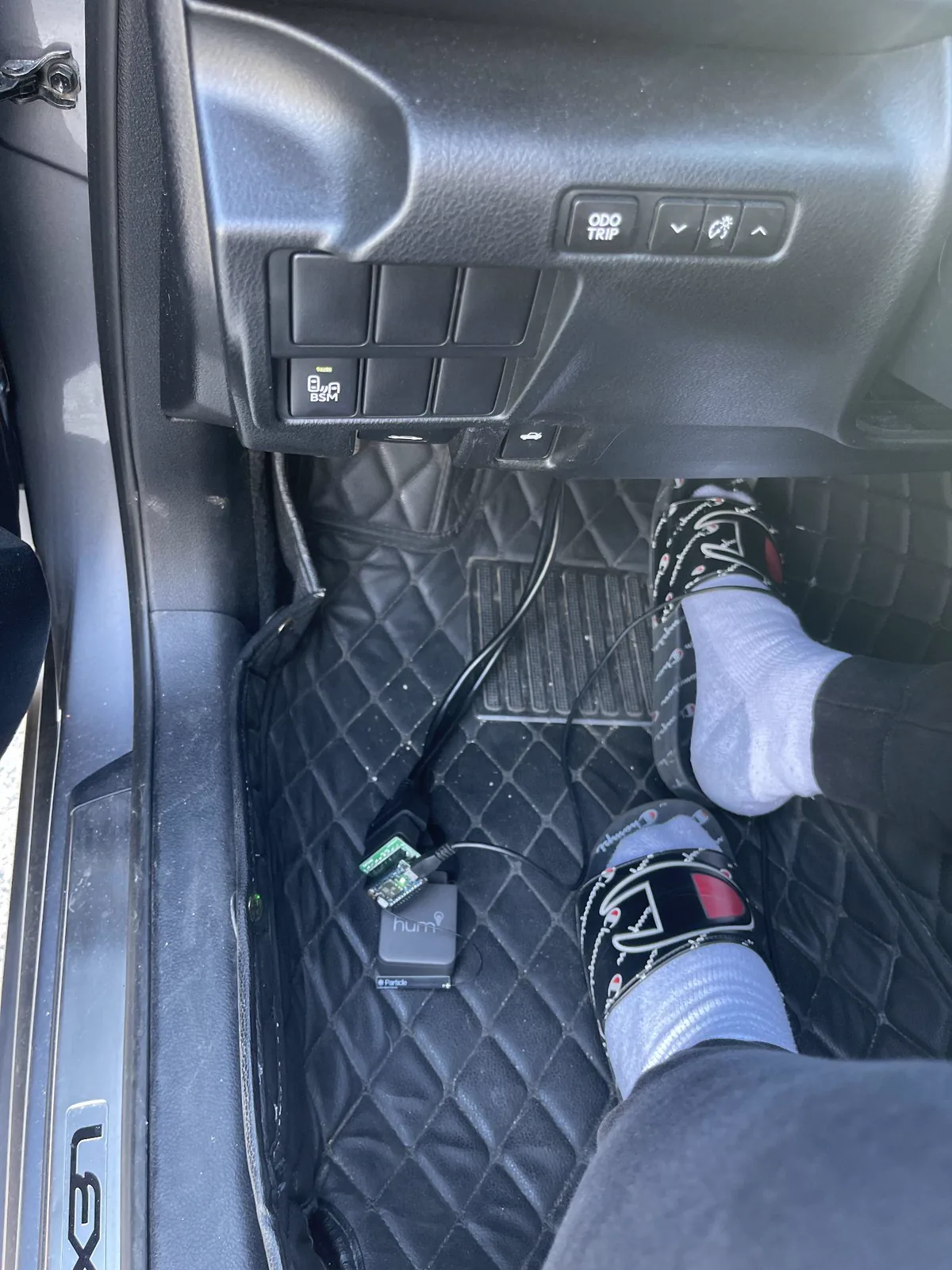 Carloop and OBD hardware connected inside the vehicle